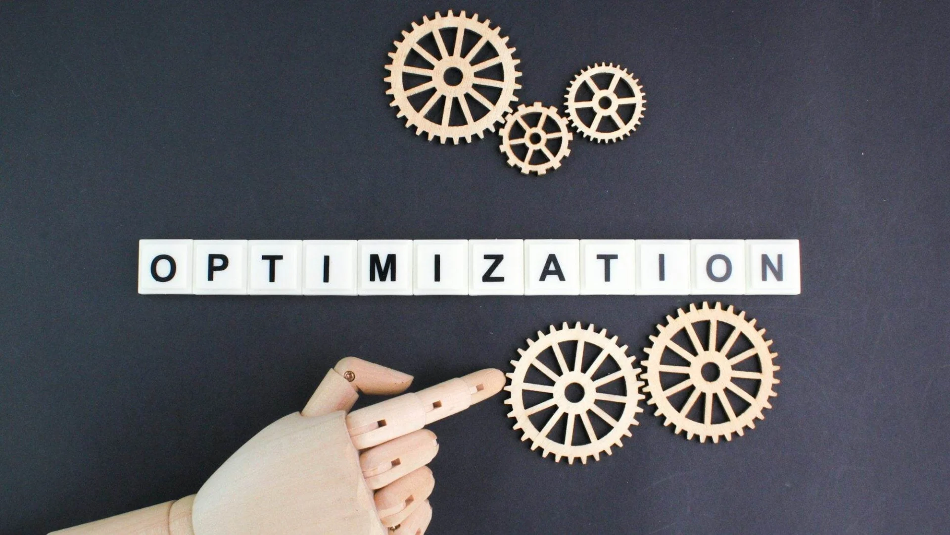 7 Effective Website Optimization Strategies in 2024 gear teeth with the word Optimization.